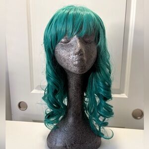 Hestia Wavy Teal Green Wig with Bangs